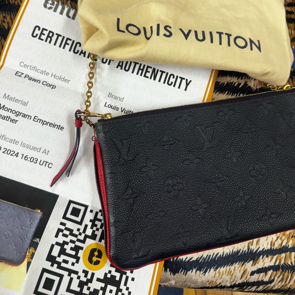 Louis Vuitton monogram empreinte double zip